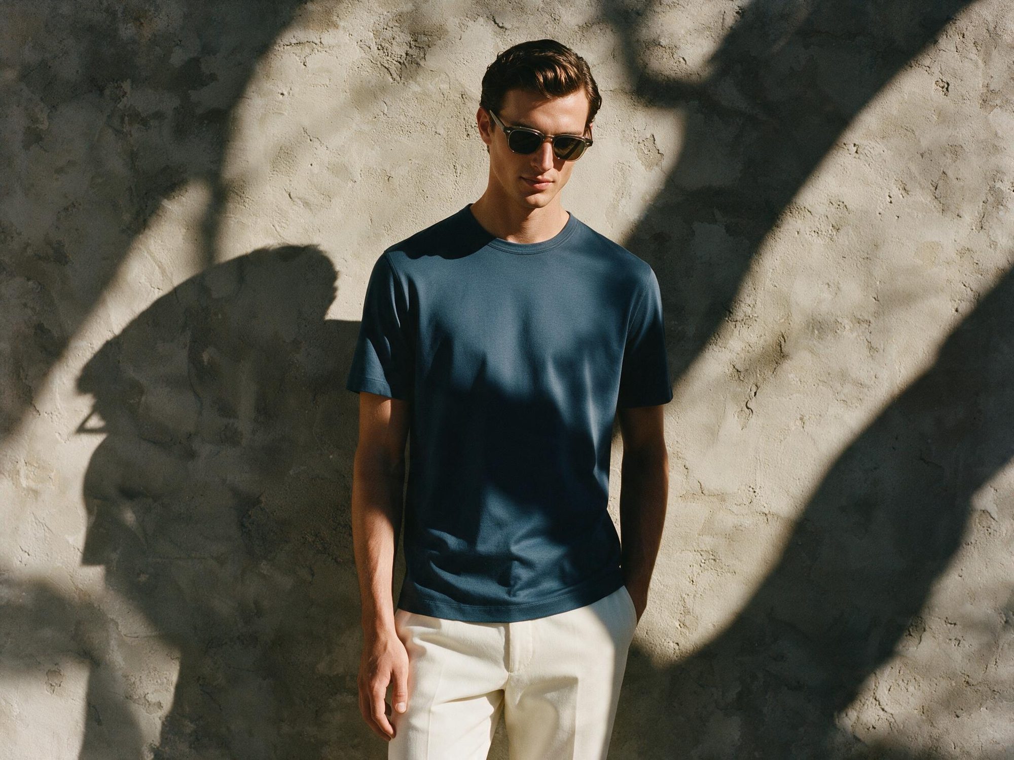 Scallero model portrait wearing a brown t-shirt